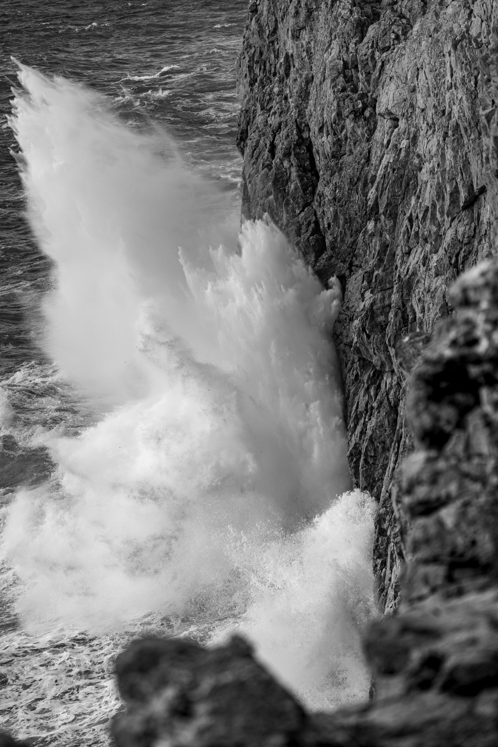 Big wave hitting the cliffs 