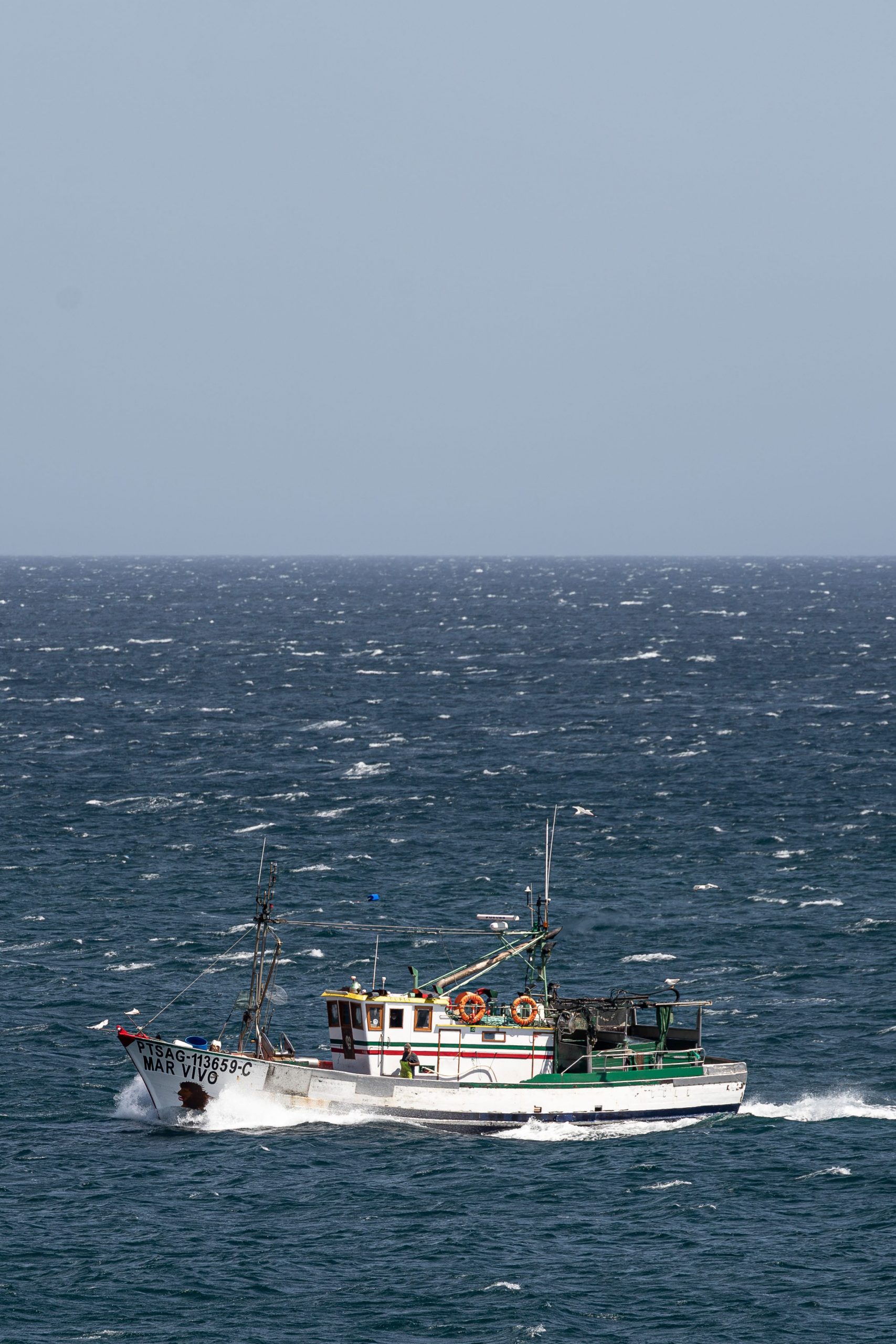 Fishing vessel in windy seas