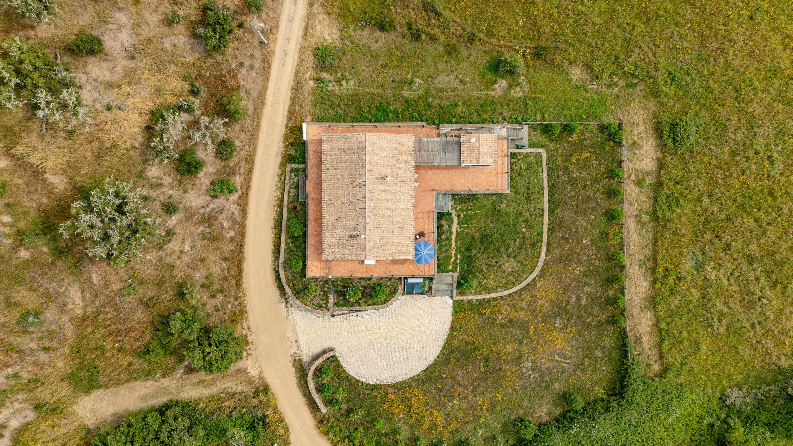 Aerial view of country house from above